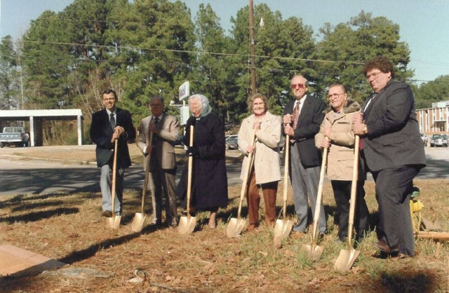 Ground Breaking of the New Library. l to r: Library Director Howard L. Coy Jr., Finly Stanly, Library Board President, Board members Olive Peterson and Margie Roqzee; Ray Pynes, Police Jury President; Marvin Deason, Board member; Richard LeBlanc, Architect, Shreveport, La. Ground Breaking for new Library, 1994