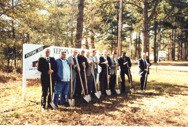 Groundbreaking 1994. Police Jury Members (l. to r.): Reid Weeks, John Hamilton, Raymond Palmer, Lavaughn Roshong, Woodrow James, George Jeane, Ray Pynes. Not shown are jorors John Ford and J. R. "Butch" Smith and Parish Manager Tommy Frye. Groundbreaking on the future site of the Leesburg Branch